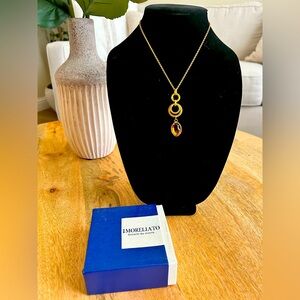 Perfect condition! Morellato mickle, gold, and amber crystal color